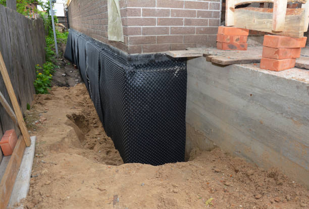 Happy homeowners after waterproofing job in Sicklerville